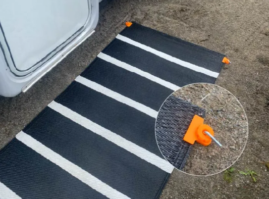 Tapijt houders voor de camping